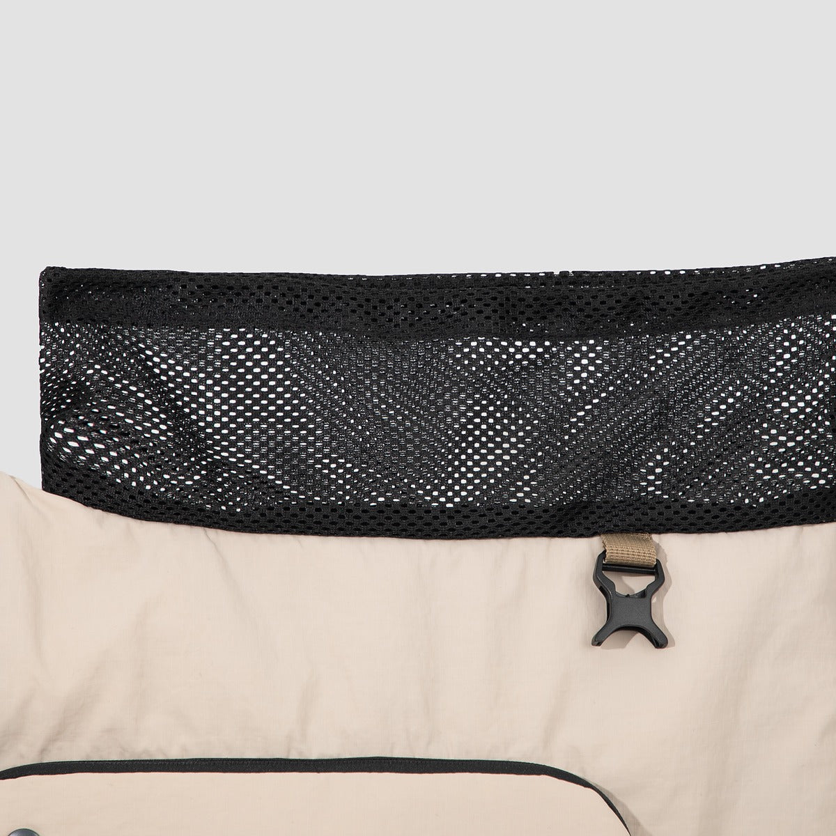 Top mesh panel with buckle on beige HiDREAM Crossbody Travel Bag for Pets, designed for ventilation and pet safety.