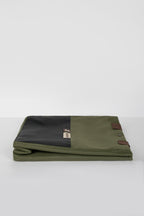 Folded green HiDREAM Padded Tote Bag showing its compact, space-saving design for convenient storage and travel use.