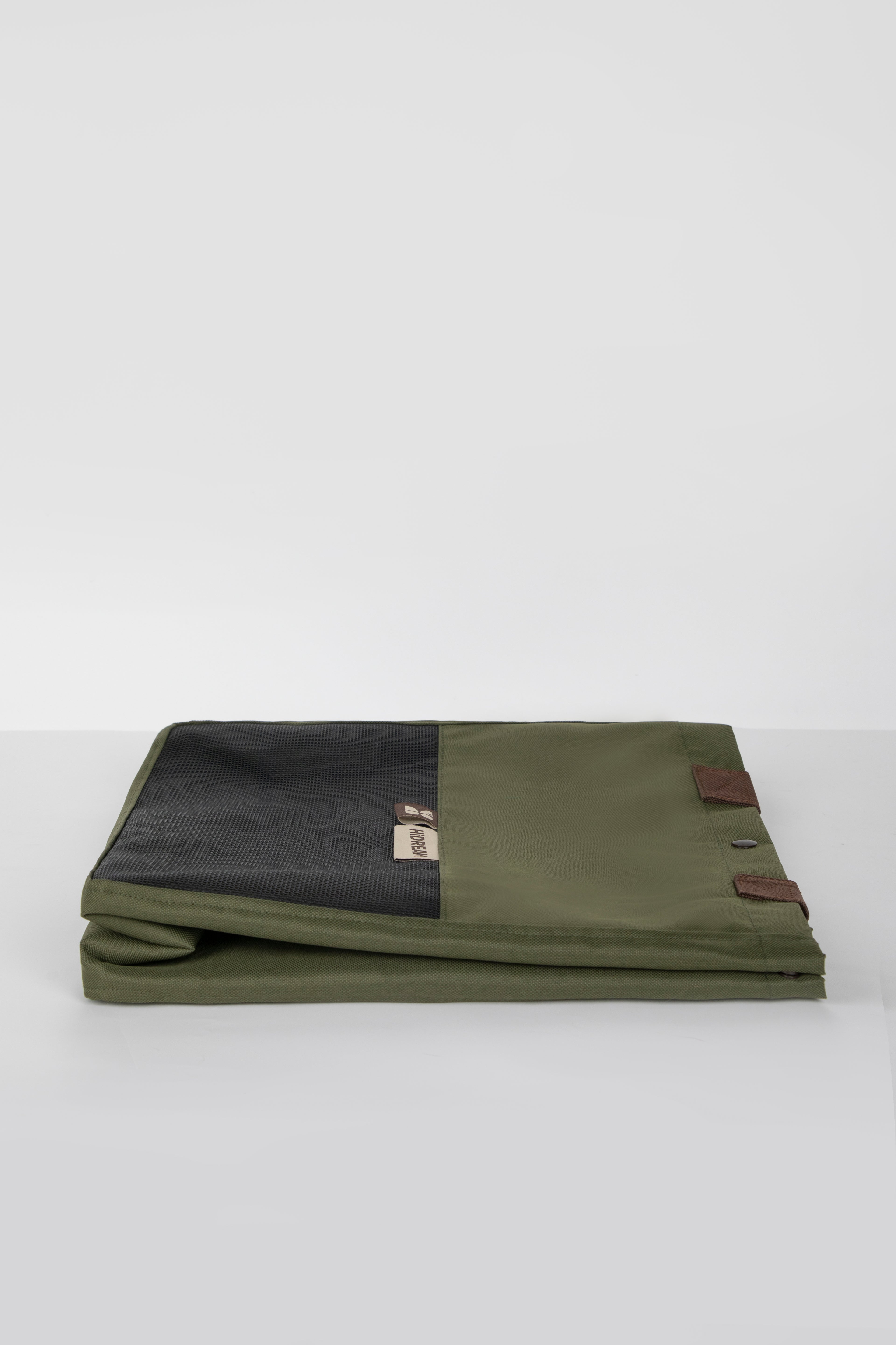 Folded green HiDREAM Padded Tote Bag showing its compact, space-saving design for convenient storage and travel use.