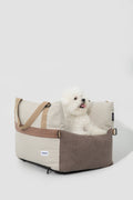 HiDREAM Dog & Cat Car Safety Seat with fluffy white dog lounging inside. Soft, comfy pet travel bed for safe car rides.