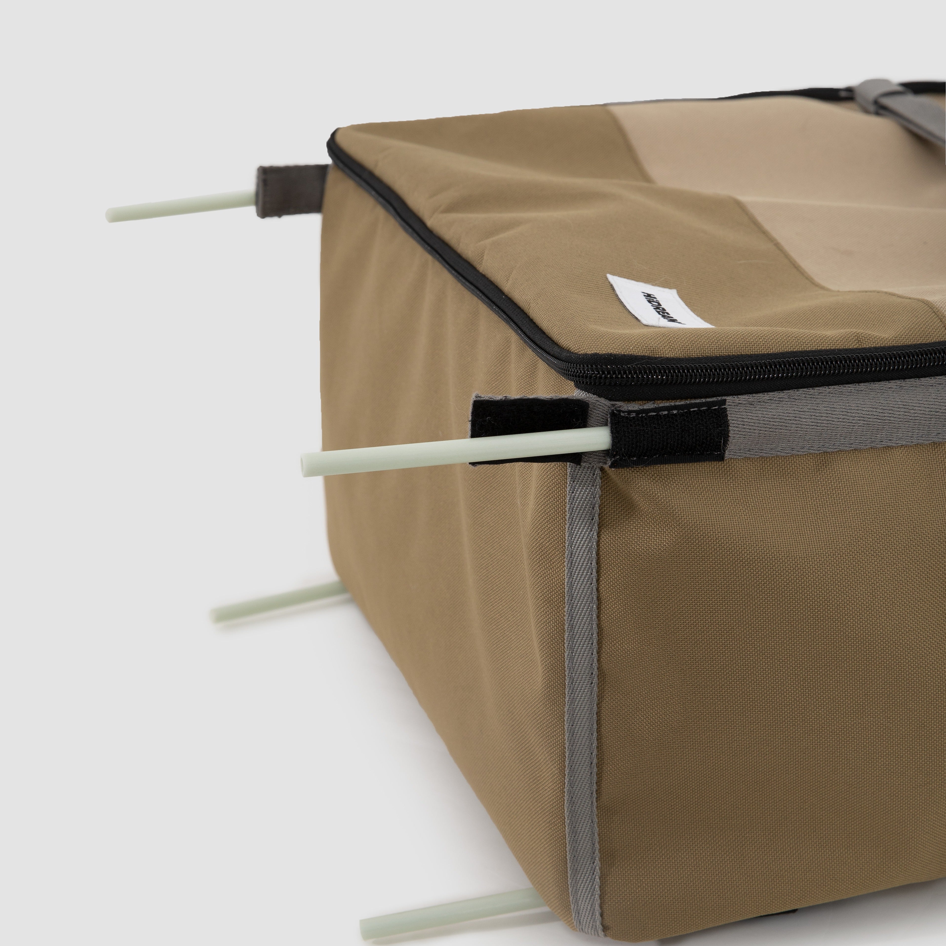 Bottom view of HiDREAM Pet Car Seat Backpack – Dual Use Carrier showing support rods for structural stability during use as a car crate.