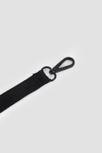 Close-up of secure leash clip inside HiDREAM Mountain Series Chest Pet Tote, ensuring pet safety during travel.