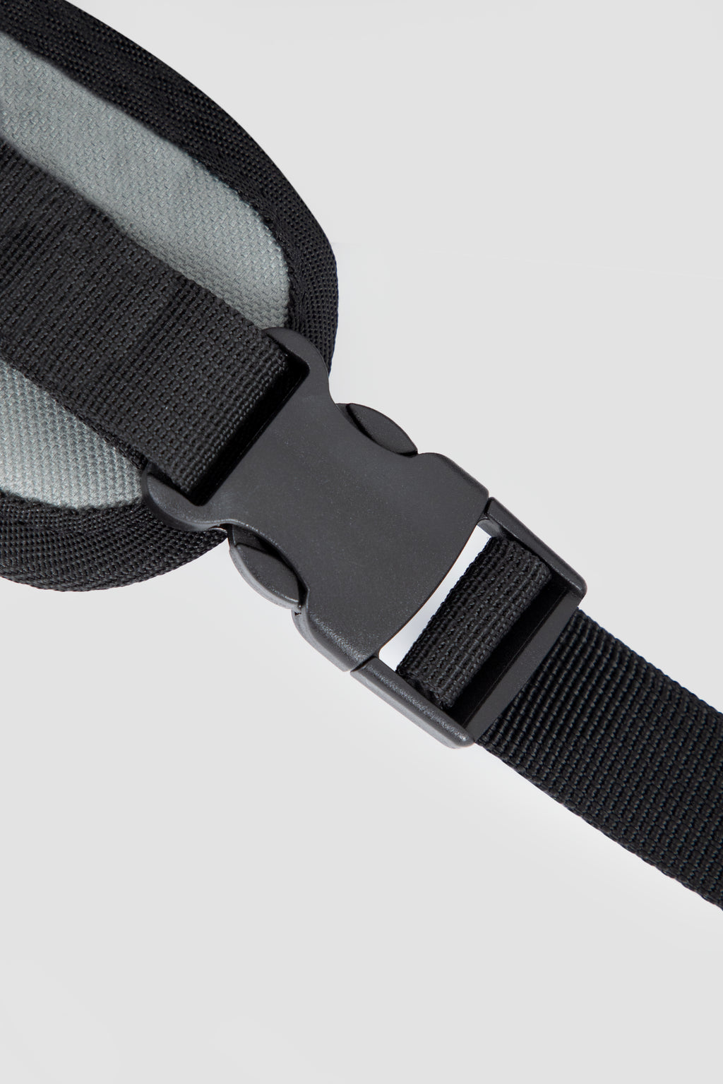 Detail of adjustable buckle strap on HiDREAM Mountain Series Chest Pet Tote, enhancing fit and comfort for pet owners.