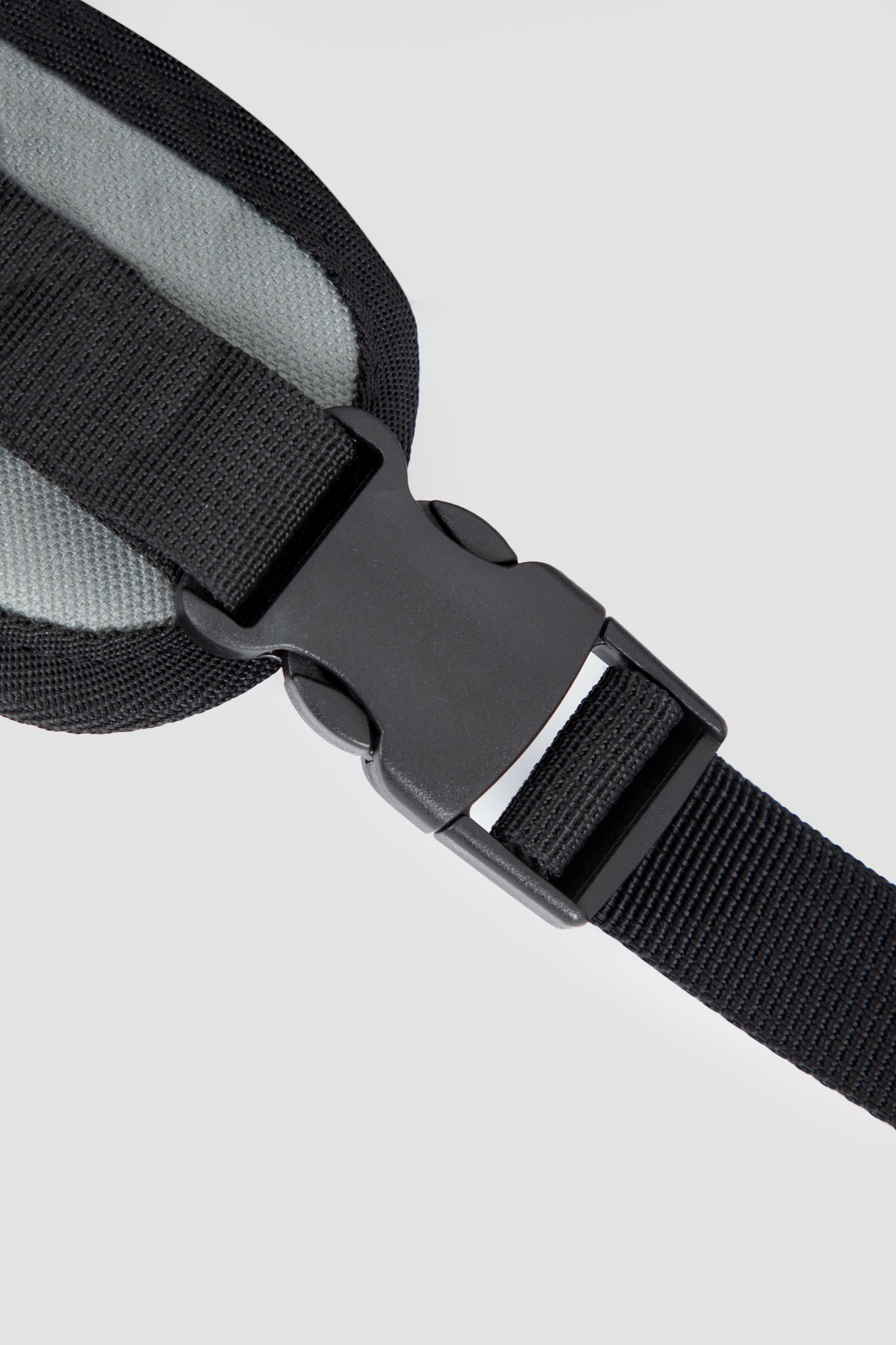 Detail of adjustable buckle strap on HiDREAM Mountain Series Chest Pet Tote, enhancing fit and comfort for pet owners.