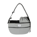 HiDREAM Crossbody Pet Carrier Tote in grey, featuring a spacious, ergonomic design for pets up to 7kg. Lightweight and waterproof for daily use.