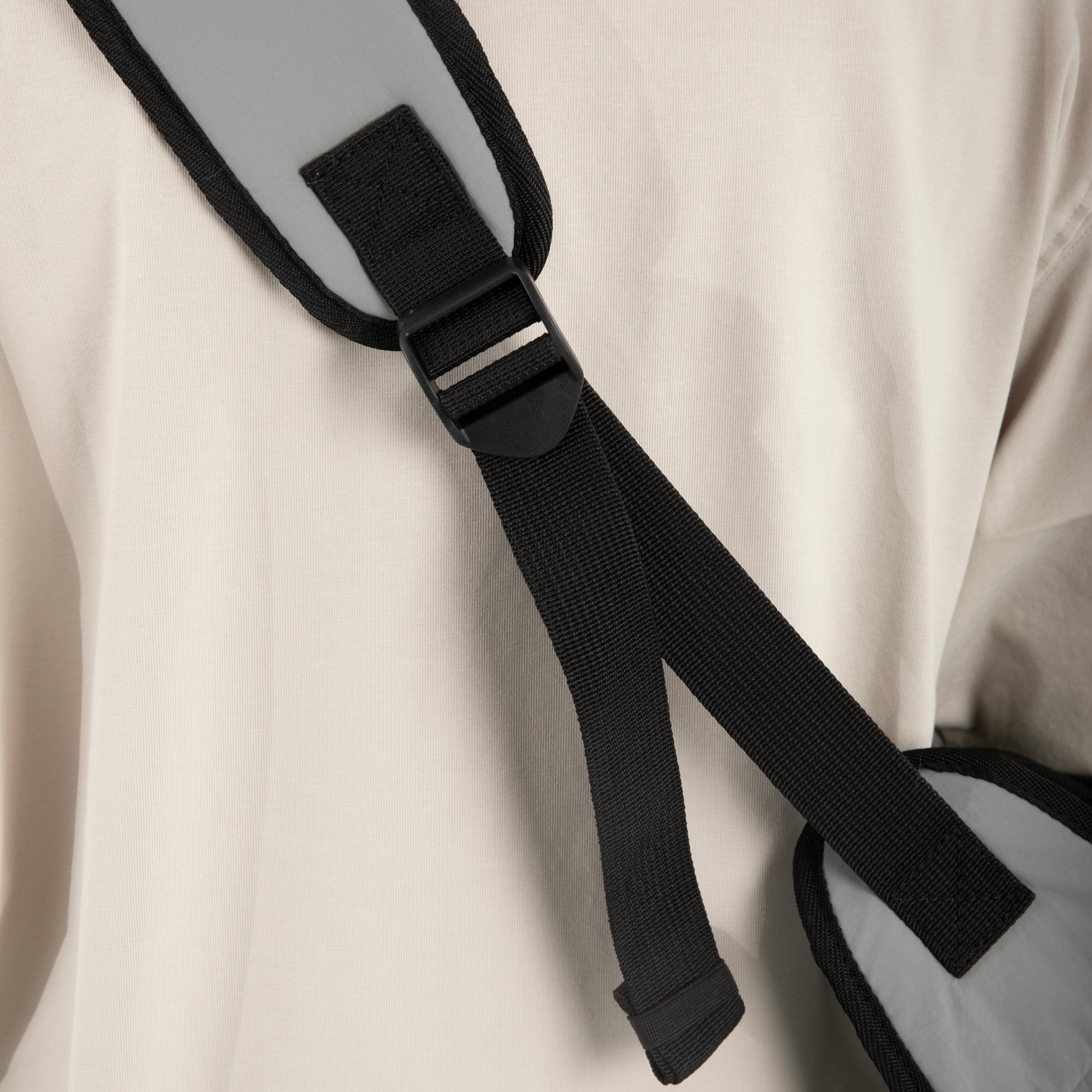 Adjustable strap detail on HiDREAM Crossbody Pet Carrier Tote. Ensures a secure and customized fit for pet owners.