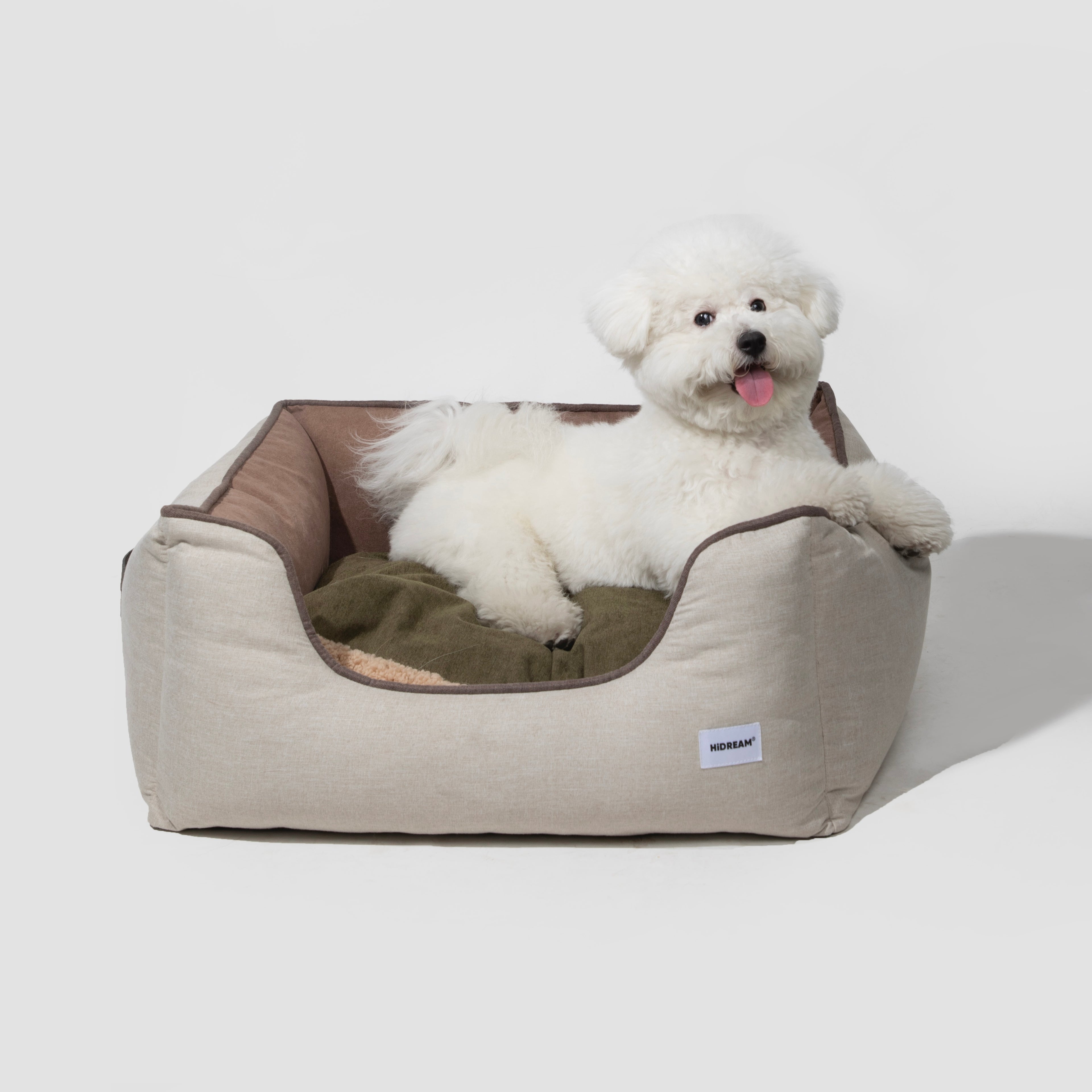 HiDREAM Four-Season Pet Bed with fluffy white dog lounging on dual-sided cushion. Comfortable, washable and anti-slip pet nest.