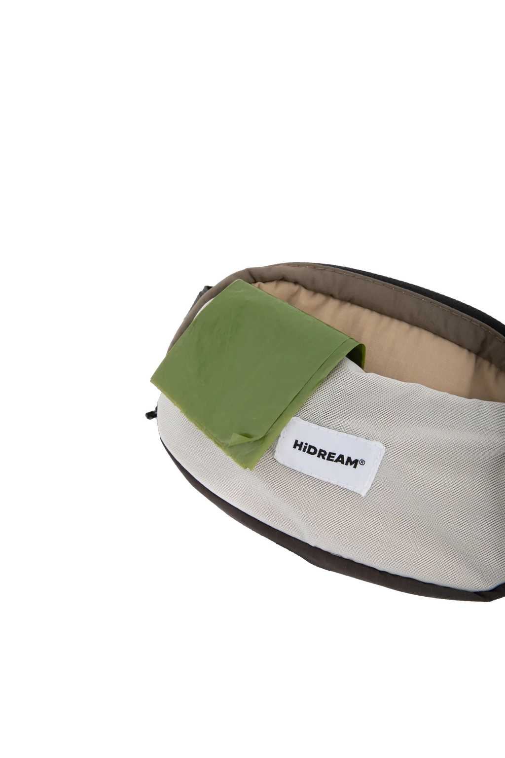 Dog waste bag stored in the flexible front pocket of the waist bag