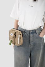 HiDREAM Toast dog treat pouch clipped to jeans at the waist