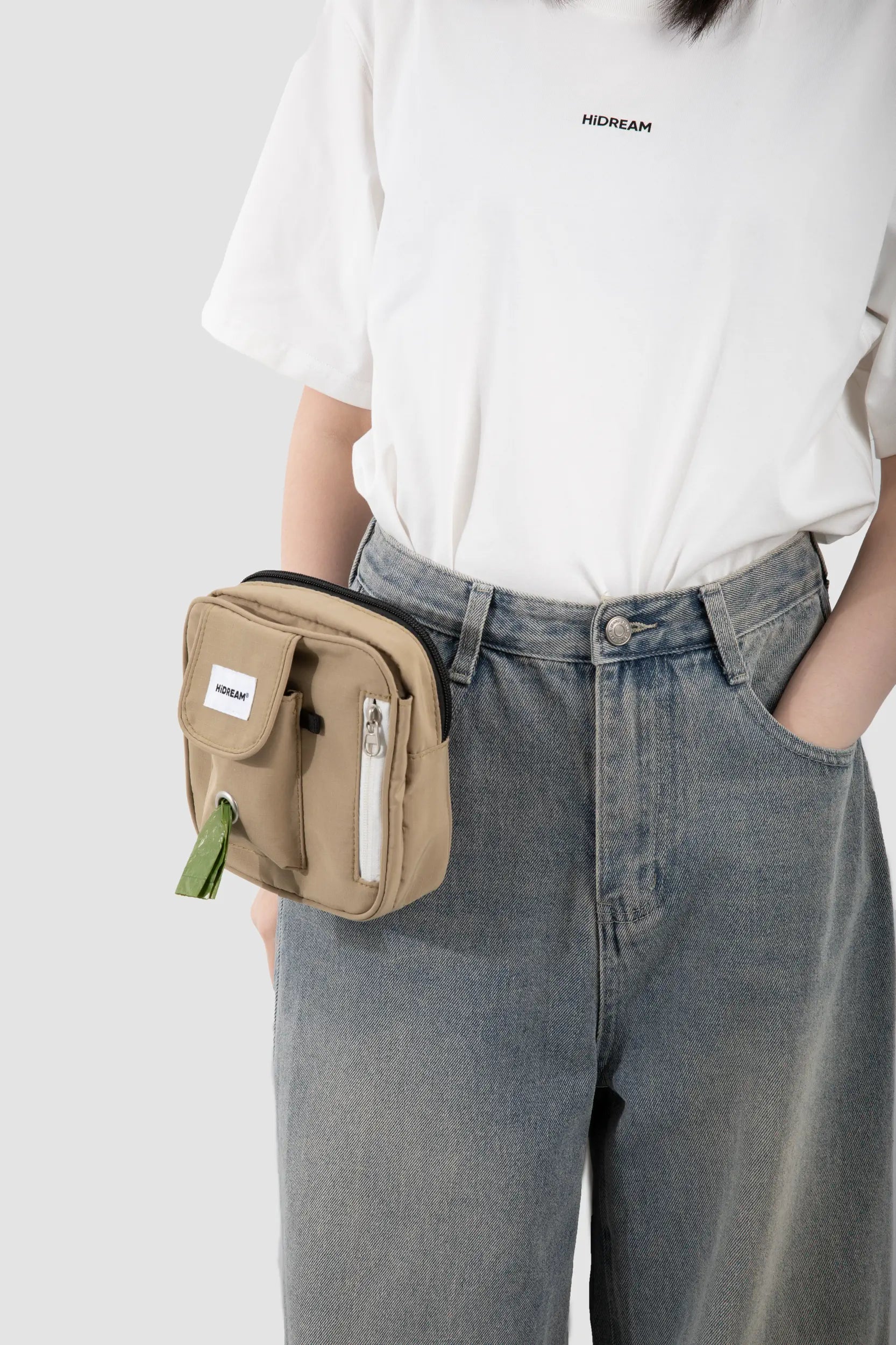 HiDREAM Toast dog treat pouch clipped to jeans at the waist