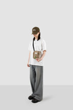 Terracotta Brown dog treat pouch worn crossbody with an adjustable strap
