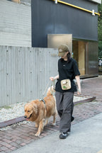 HiDREAM Toast dog training treat pouch in Terracotta Brown worn on a dog walk